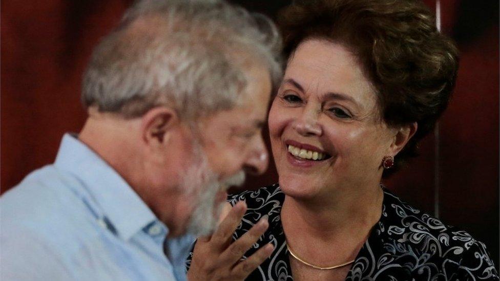 Former Brazilian president Luiz Inacio Lula da Silva speaks with former President Dilma Rousseff during a meeting with members of the Workers Party (PT), that decided Lula da Silva will be its candidate again in the 2018 election,