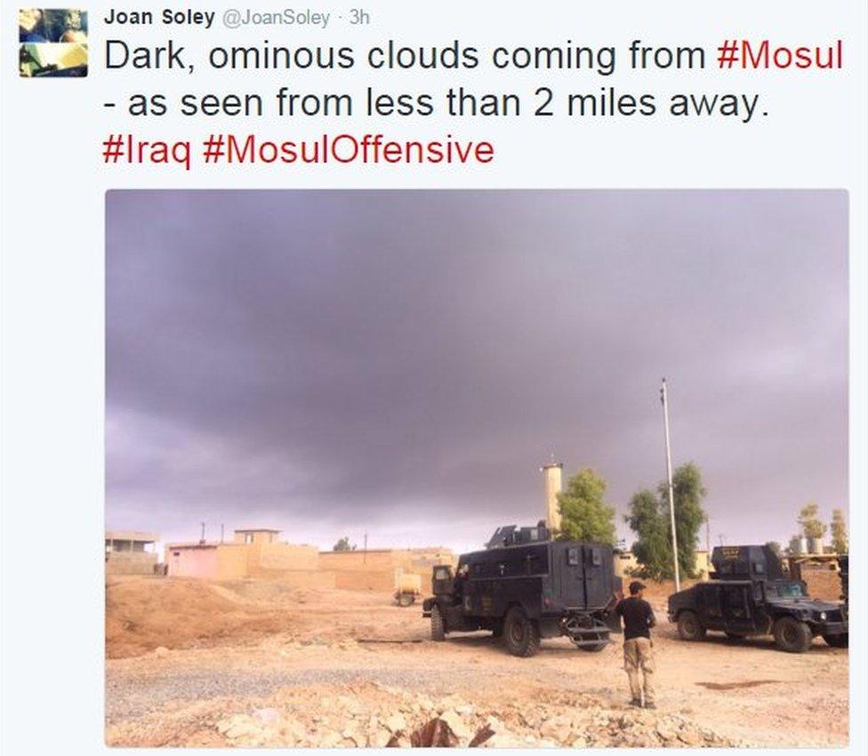 Tweet from Joan Soley reads: Dark, ominous clouds coming from Mosul - as seen from less than 2 miles away.