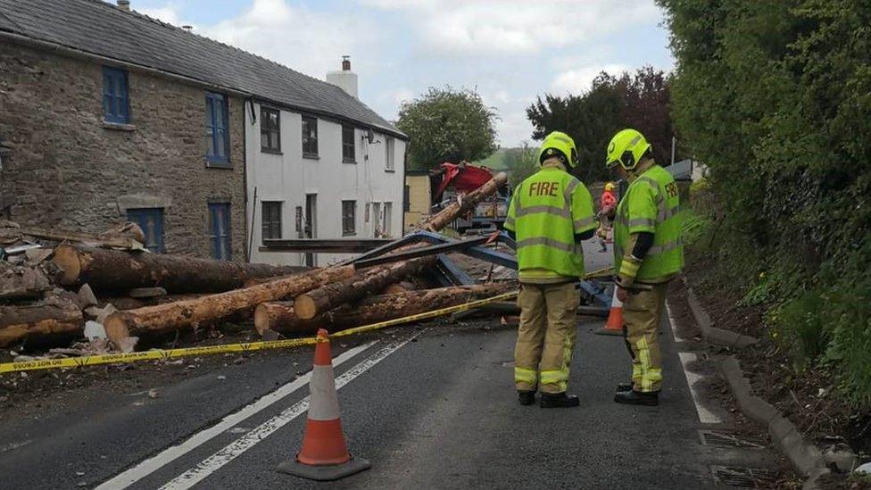 Firemen expecting the road