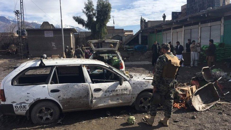 Pakistani security officials inspect the bomb explosion site at a vegetable market in Parachinar city, the capital of Kurram tribal district on the Afghan border on January 21, 2017.