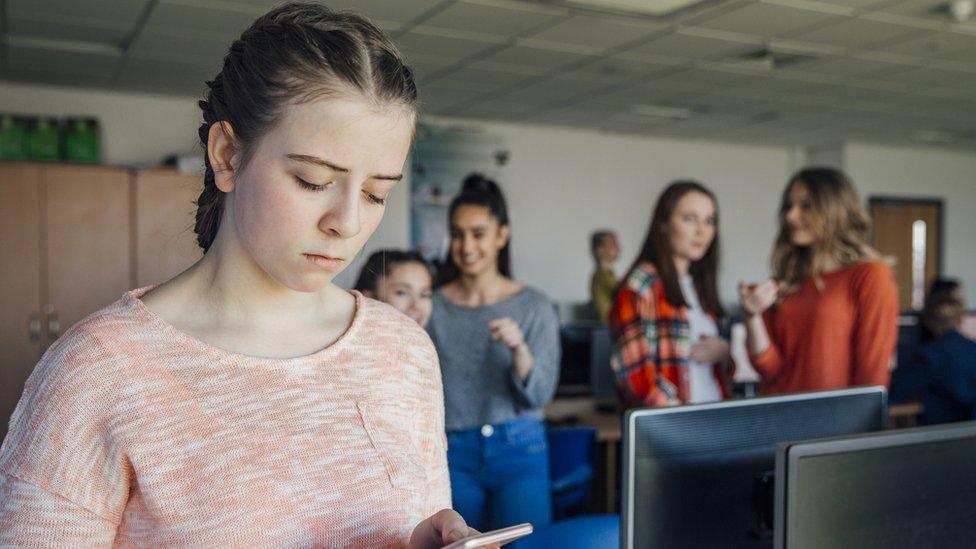 Teenage girl being bullied