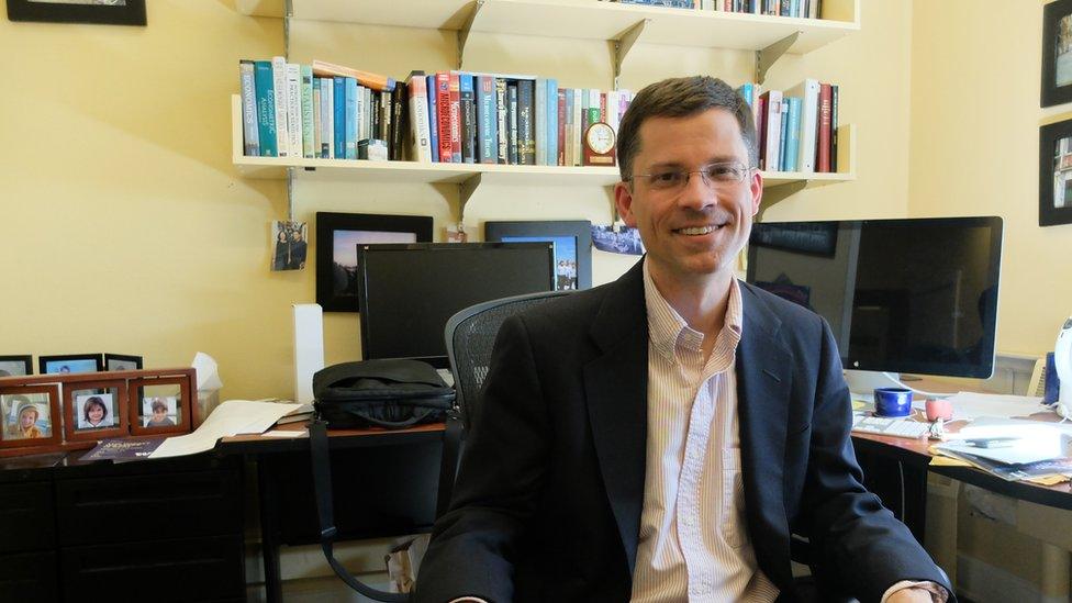 Jacob Vigdor in his office at the University of Washington