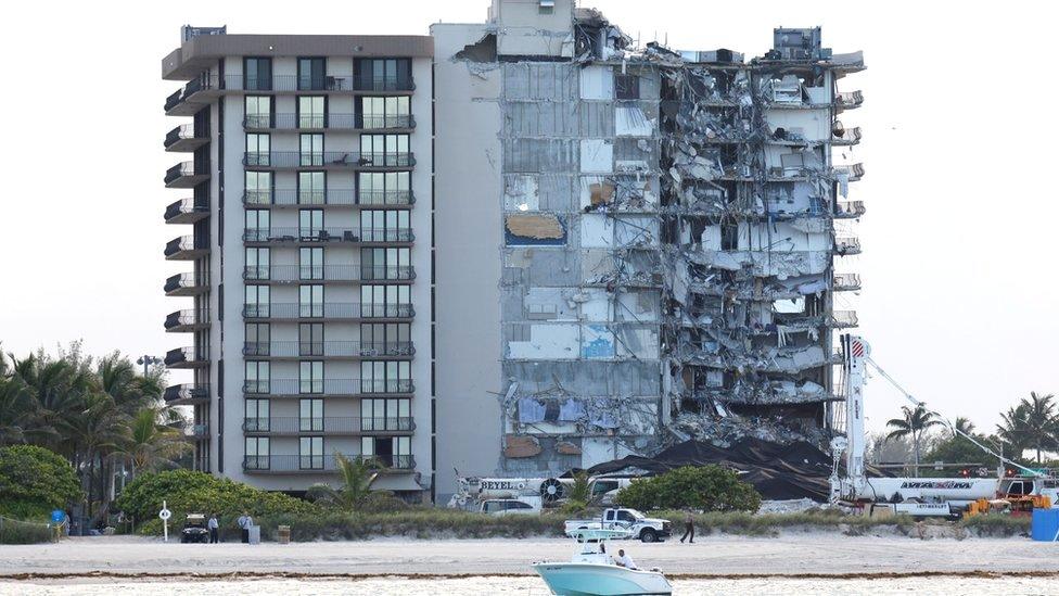 View of the partially collapsed residential building as rescue operations are stopped, in Surfside, Florida, 4 July 2021