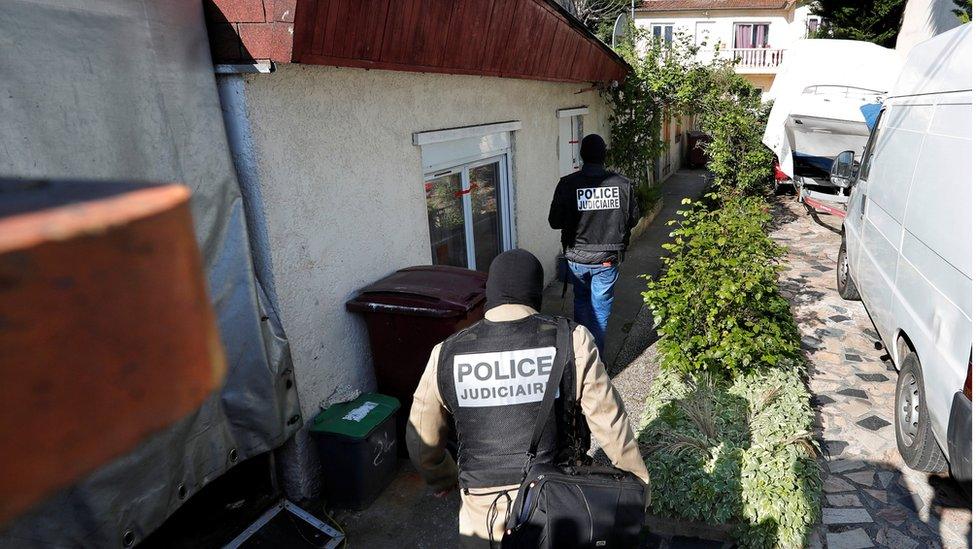 Police at house of suspected gunman in Paris suburb of Chelles