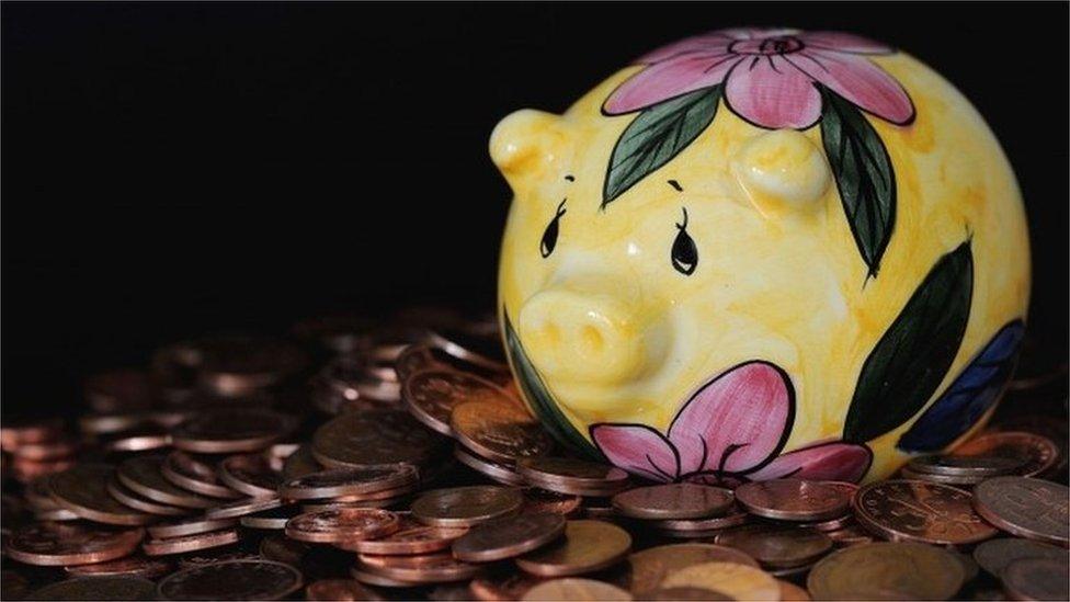 sad looking piggy bank