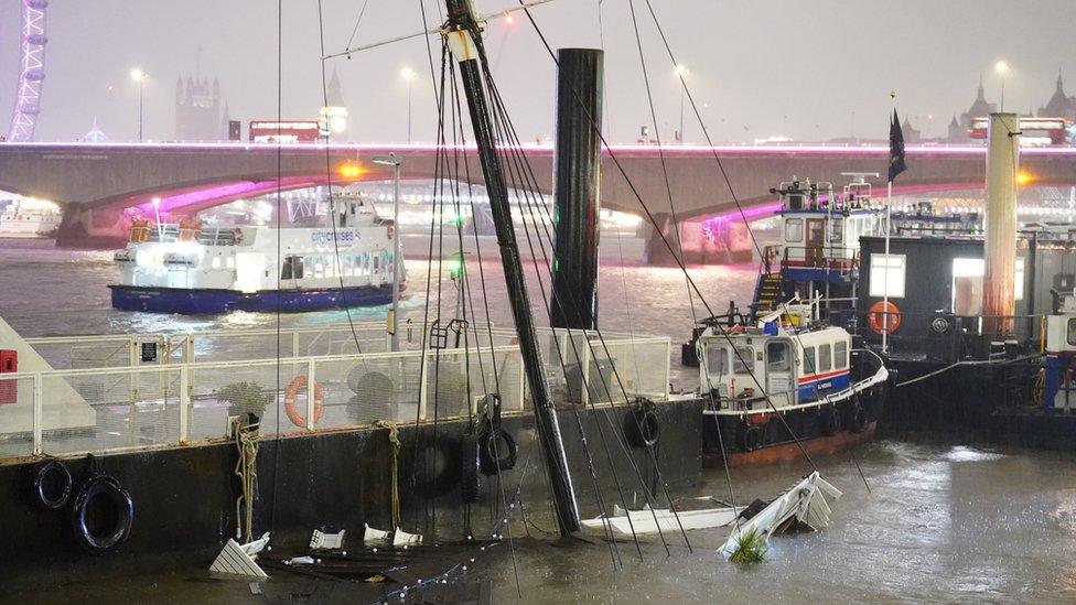 Only the mast of the boat could be seen popping out of the Thames