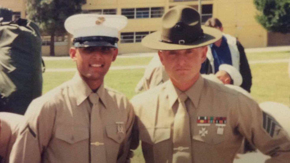 Tayyib Rashib (left) poses for a photo with his drill instructor Sgt Hall