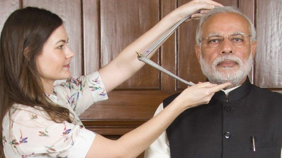 Narendra Modi models for his wax statue