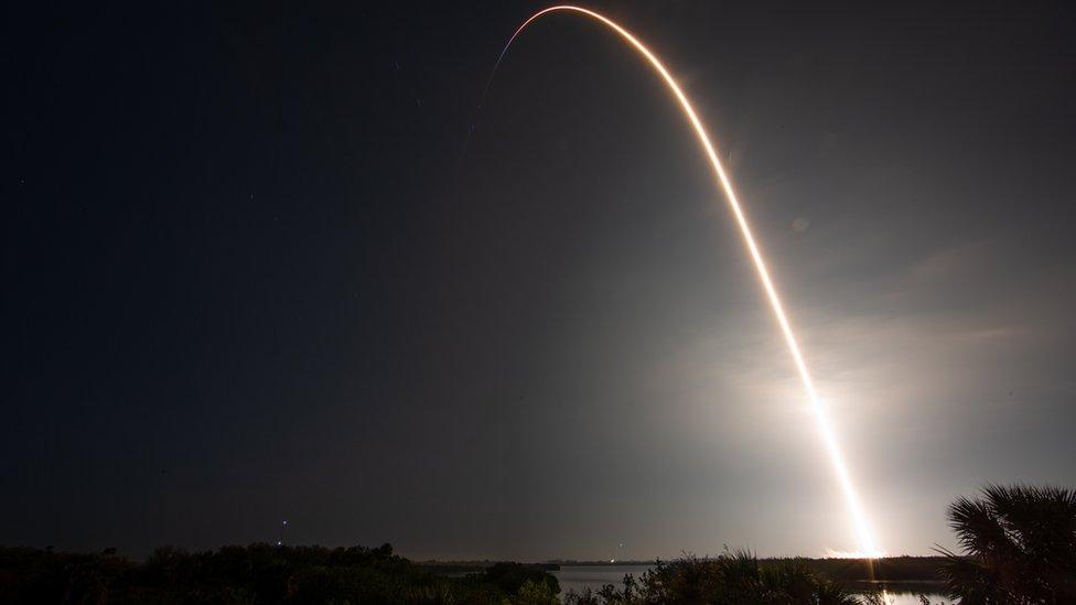 SpaceX Crew Dragon capsule on top of a Falcon 9 rocket