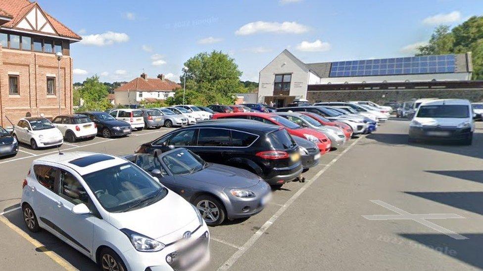 Westbury Hill car park in Westbury-on-Trym, with the GP surgery at the rear