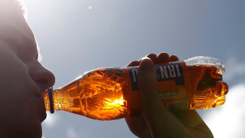 boy drinking irn bru