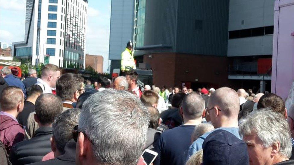 Fans outside Old Trafford