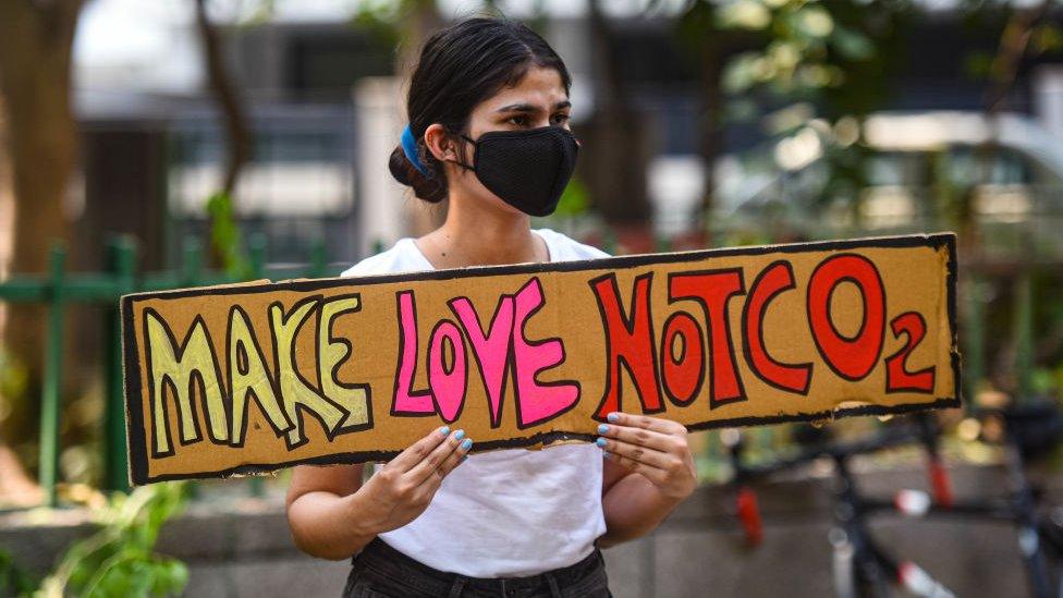 n activist with a placard takes part in a protest against climate change outside Ministry of Environment, on September 25, 2020 in New Delhi, India.