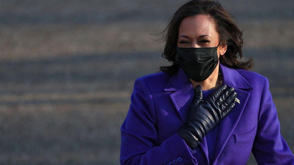 US Vice President Kamala Harris walks the abbreviated parade route after US President Joe Biden's inauguration