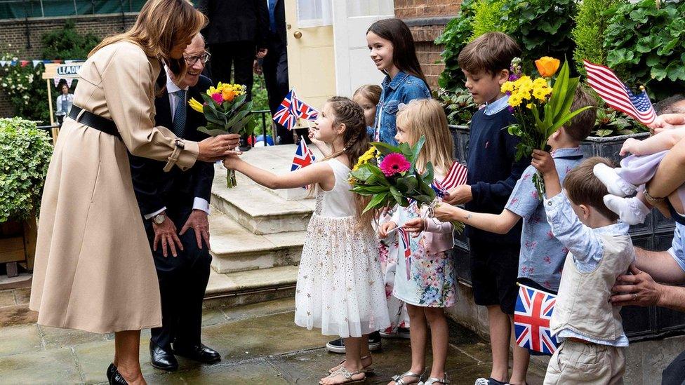 Melania Trump and Philip May meet children at a garden party at Number 10