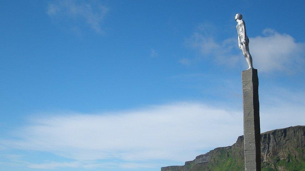 Statue of a human figure