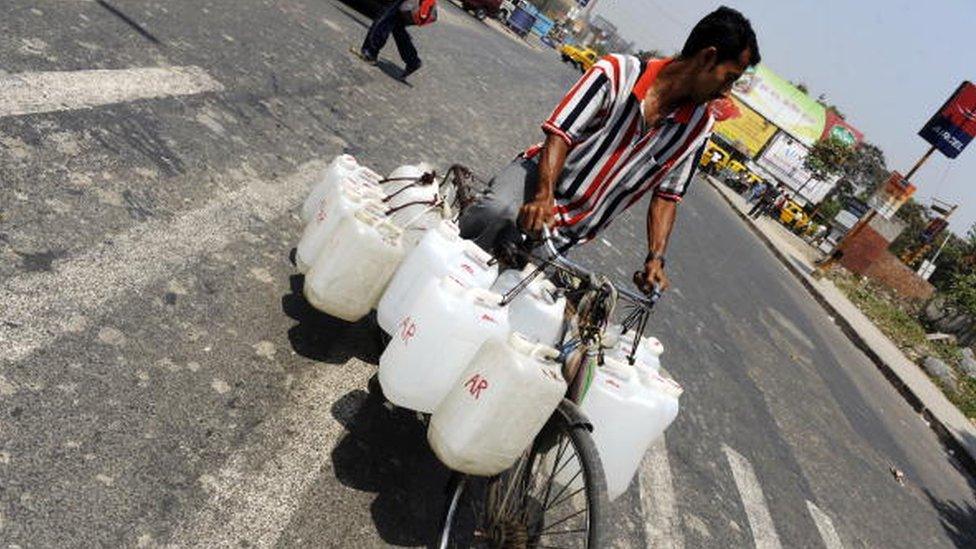 Man carrying water