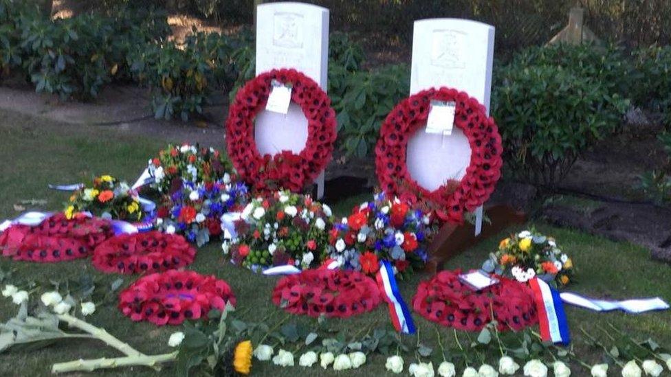 Poppy wreaths on graves