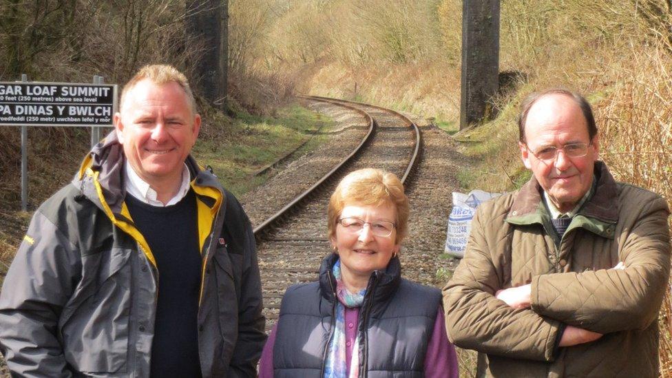 Sugar Loaf Station adopters Peter and Margaret Joyce with former BBC presenter Jamie Owen