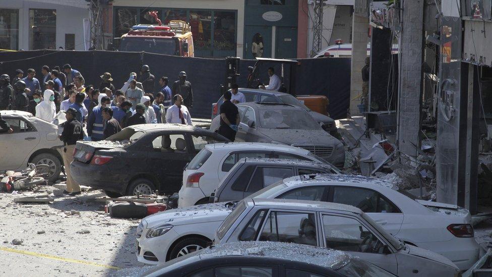 Police secure the area of explosion in Lahore, Pakistan, 23 February 2017