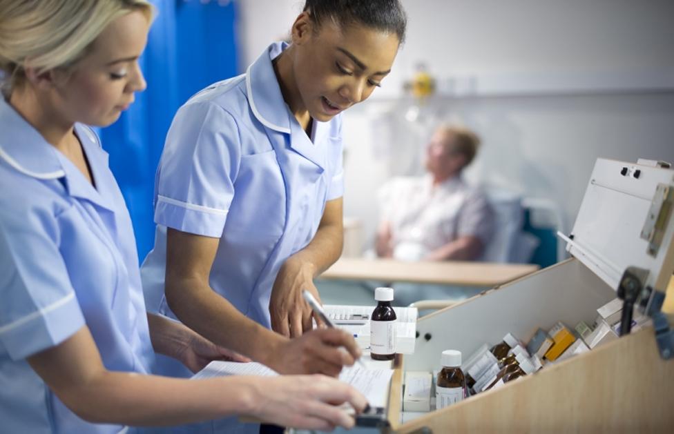 Generic image of nurses dispensing medicine on a hospital ward