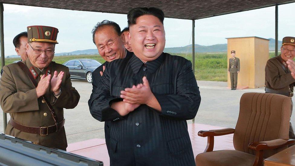 North Korean leader Kim Jong-Un inspecting a launching drill of A medium-and-long range strategic ballistic rocket