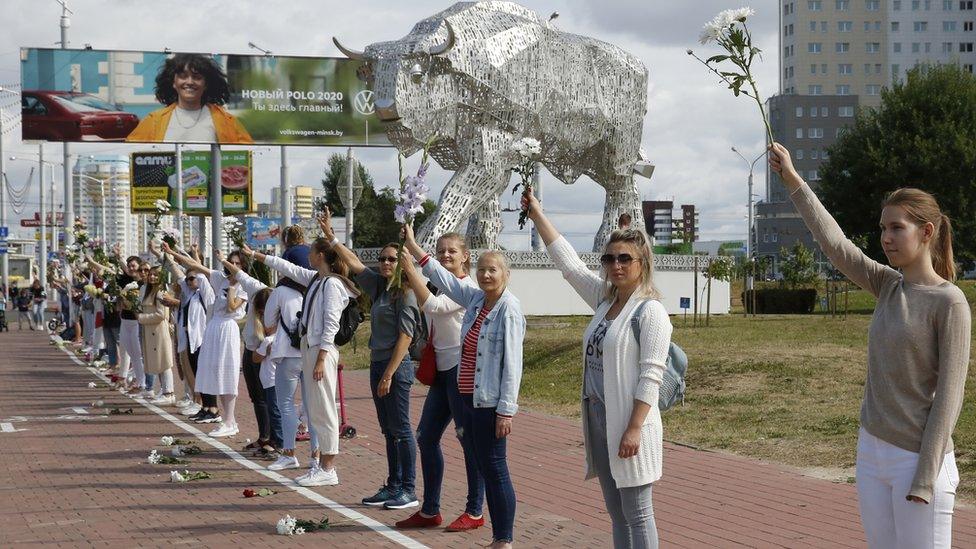 Women rally in support of detained and injured protesters in Belarus