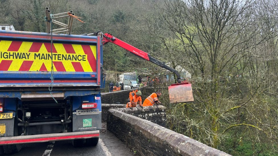 Workers at the scene