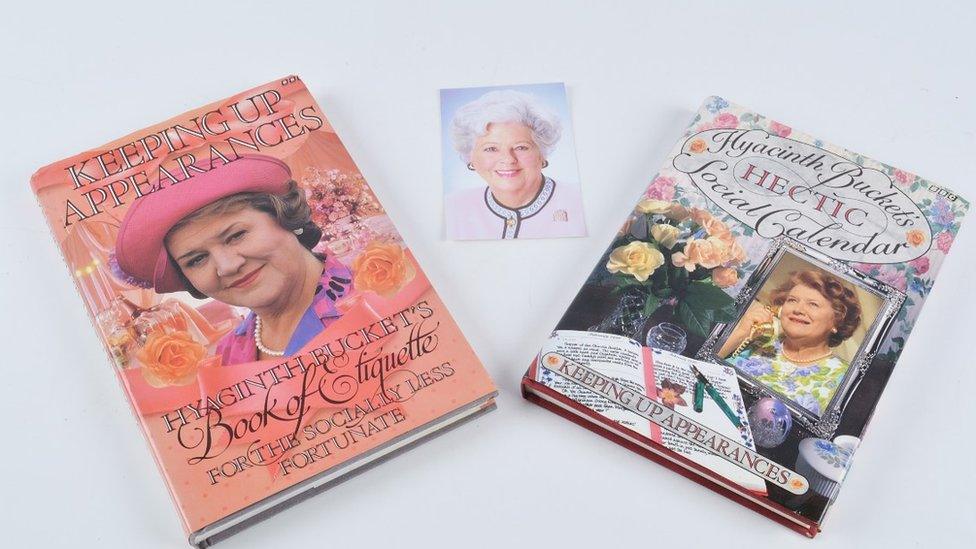 Two hardback copies of Hyacinth Bucket's books