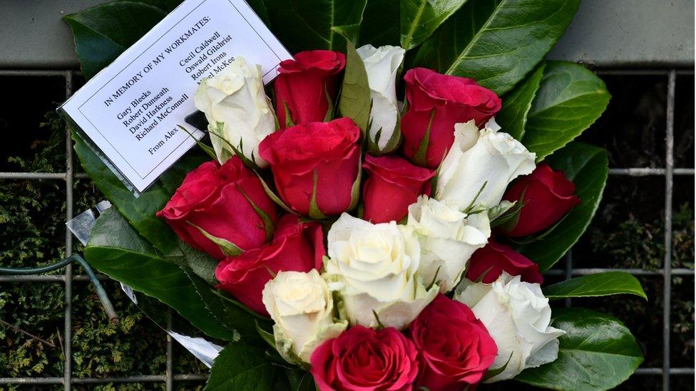 A floral tribute left at the memorial on Sunday