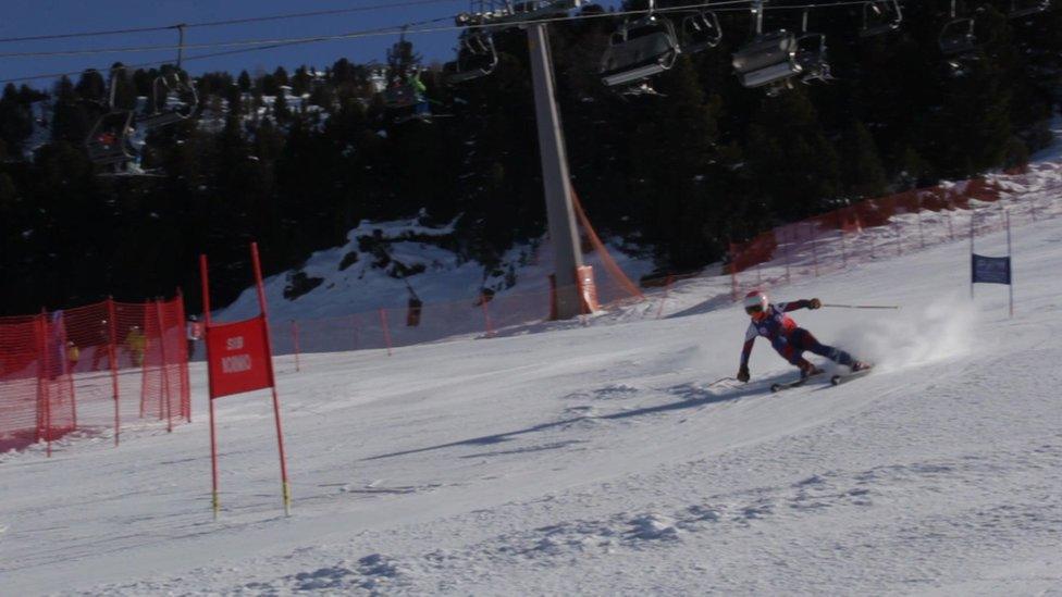 Skier on slalom course