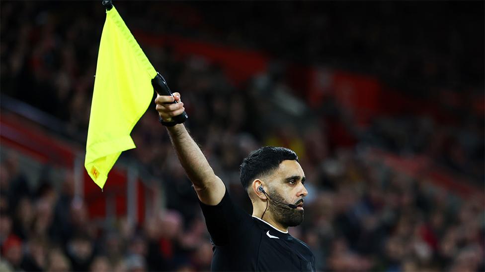 Bhupinder Singh Gill raising his flag