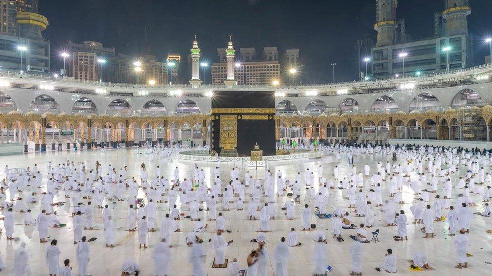 Muslims keep a safe social distance while performing Umrah at the Grand Mosque on 1 November 2020