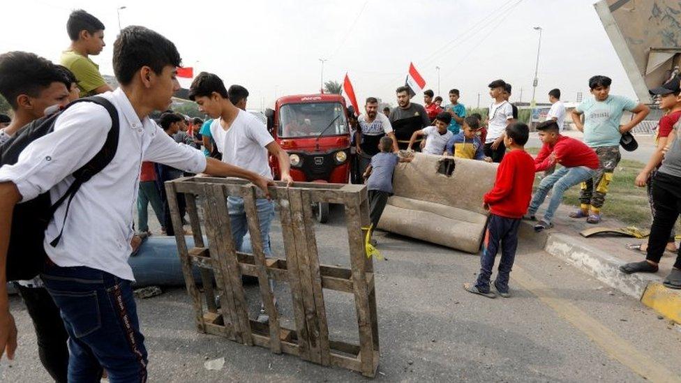 Young protesters block a road in Baghdad, Iraq. Photo: 3 November 2019