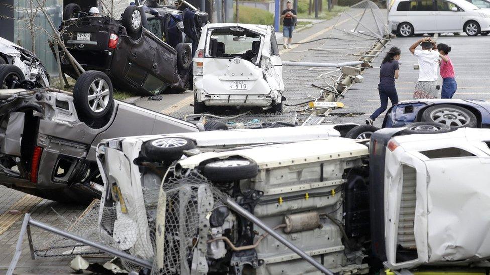 Vehicles blown over in Osaka