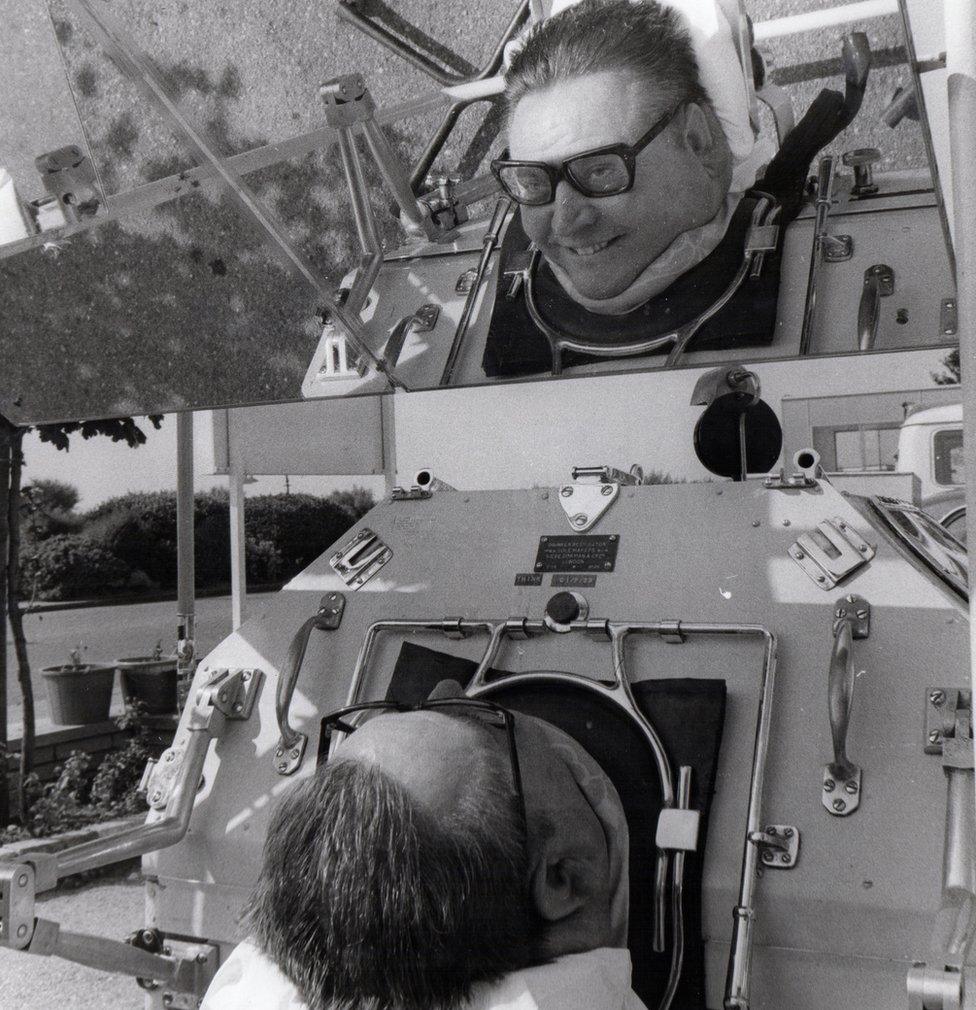 A man in an iron lung has his first seaside holiday