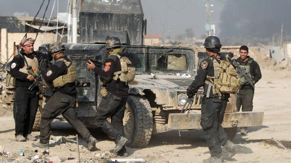 Members of Iraq's elite counter-terrorism service gather in Ramadi