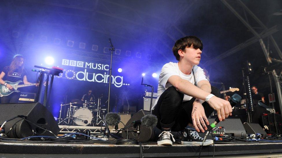 Declan on a BBC Introducing stage at a festival