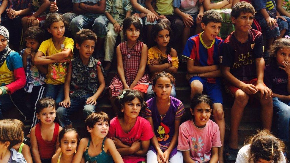 Displaced Syrian children at a camp in Latakia