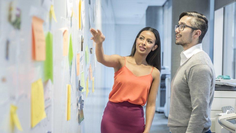 Man and woman in a workplace