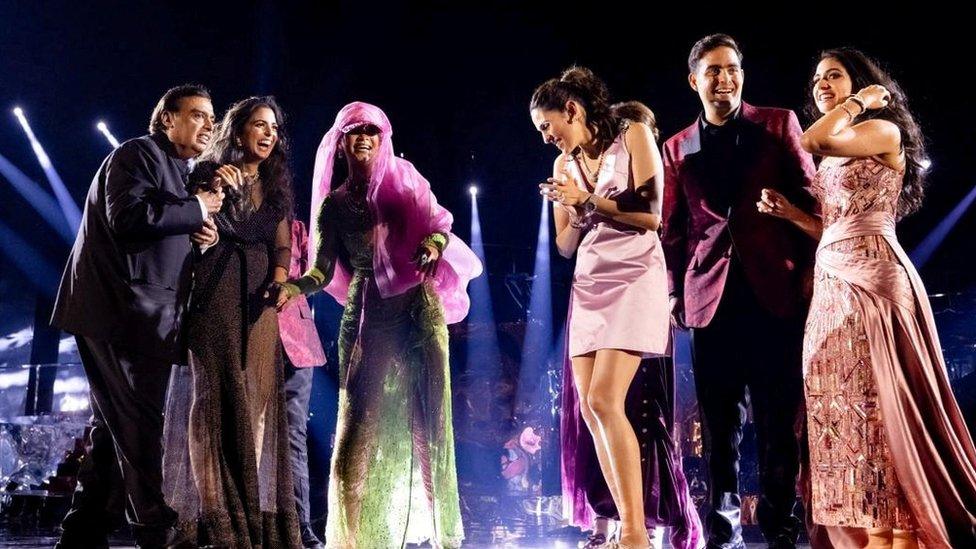 Mukesh Ambani, the Chairman of Reliance Industries, Isha Piramal, Rihanna, Shloka Mehta Ambani, Akash Ambani and Radhika Merchant react on the stage during pre-wedding celebrations of Anant and Radhika in Jamnagar, Gujarat, India, March 1, 2024.