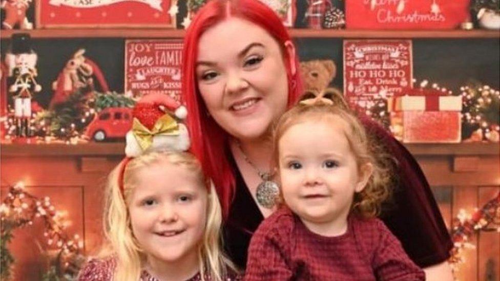 Ms Stevens with her two daughters