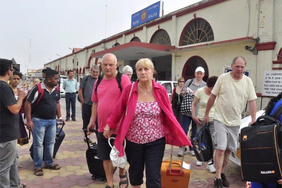 Passengers leave the Kalka railway station on the Kalka-Shimla Unesco Heritage Track on September 12, 2015