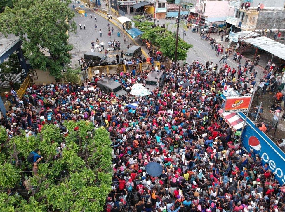 An aerial view of the migrant group reaching the Guatemala-Mexico international bridge in Tecun Uman, Guatemala