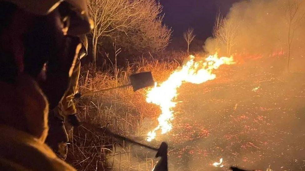 A firefighter at the scene of the blaze near Newby Bridge