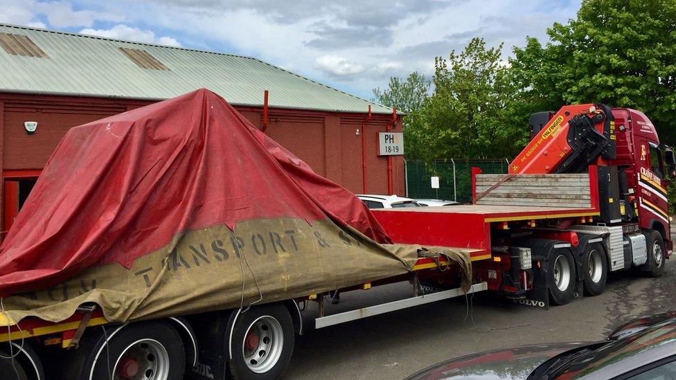 Finished statue being loaded on to lorry