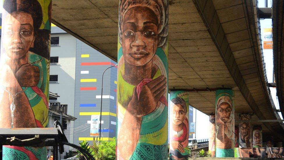 Girls' faces painted on a bridge on Saturday 5 October 2019