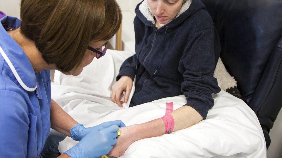 Woman receiving cancer treatment