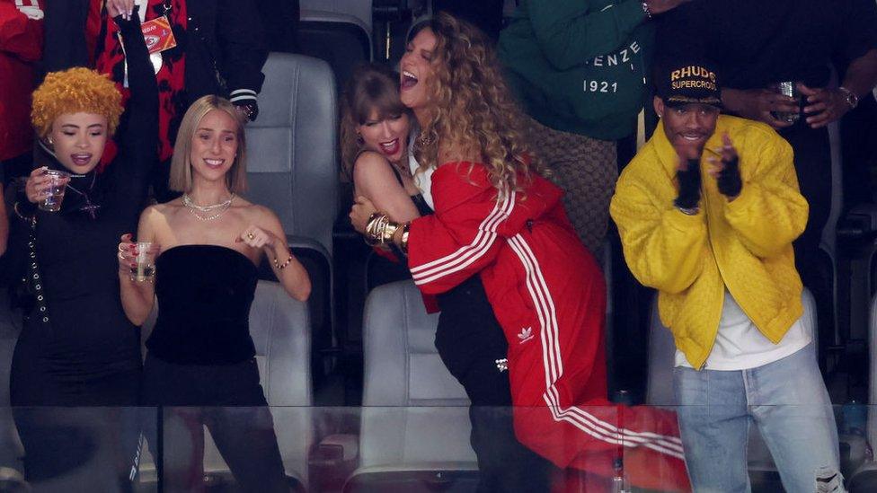 Rapper Ice Spice, Singer Taylor Swift and Actress Blake Lively react prior to Super Bowl LVIII between the San Francisco 49ers and Kansas City Chiefs at Allegiant Stadium on February 11, 2024 in Las Vegas, Nevada