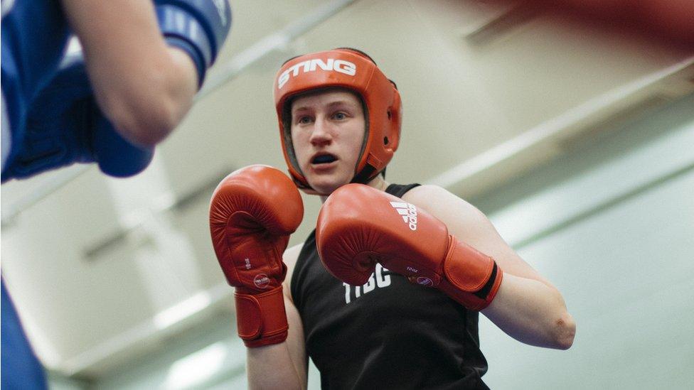 Simona Zavieka in boxing in a ring